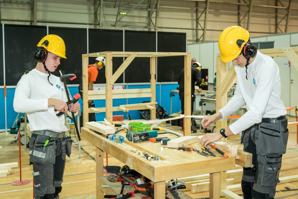 253652-young-building-carpenters.jpg